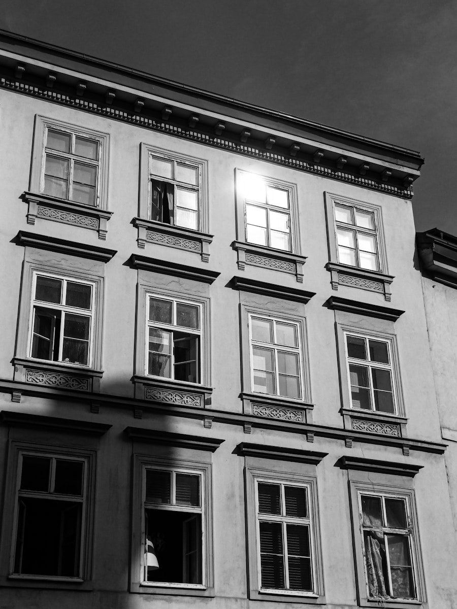 A black and white photo of a tall building
